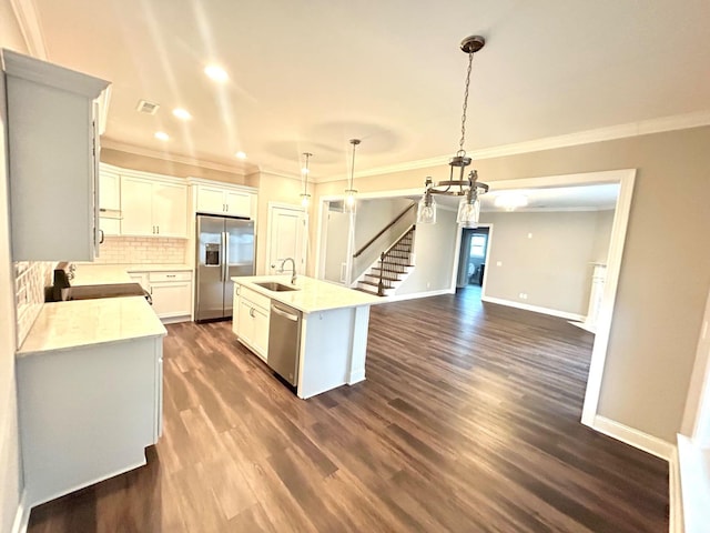 8127 Slugger Way, Chattanooga, TN 37421 - kitchen featuring stainless steel appliances, ornamental molding, light countertops, dark wood finished floors, and backsplash