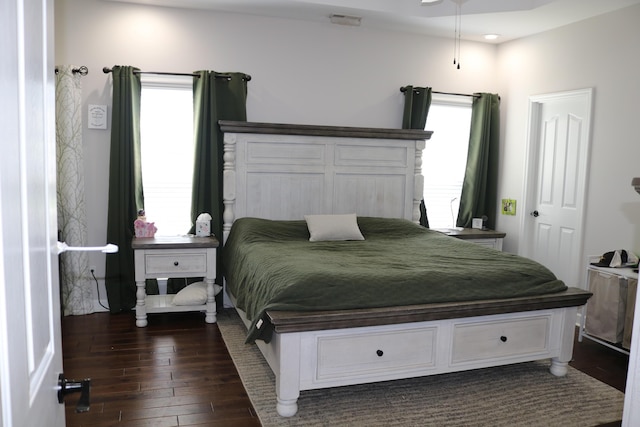 7354 Kayla Beth Ct, Ooltewah, TN 37363 - bedroom with dark wood-style flooring and multiple windows