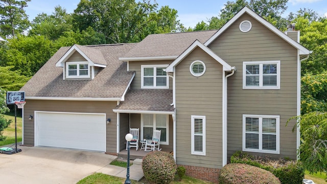 8014 Woodstone Dr, Hixson, TN 37343 - view of front of house with covered porch, concrete driveway, an attached garage, a chimney, and roof with shingles