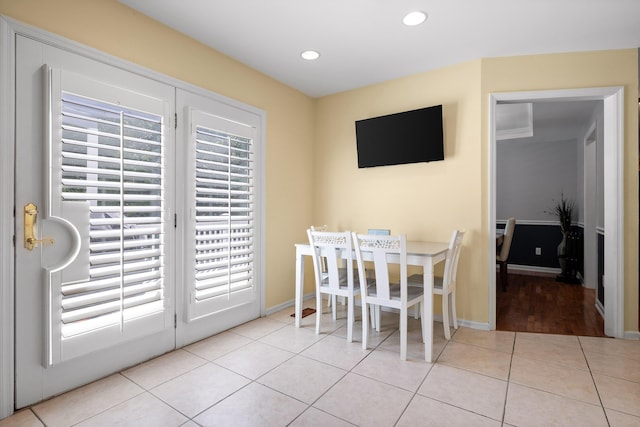 8014 Woodstone Dr, Hixson, TN 37343 - dining area with tile patterned floors and recessed lighting