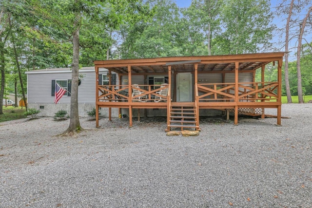 1165 Hugh Allison, Pikeville, TN 37367 - view of front facade featuring crawl space and a deck