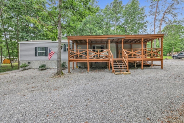 1165 Hugh Allison, Pikeville, TN 37367 - view of front facade featuring crawl space and a wooden deck