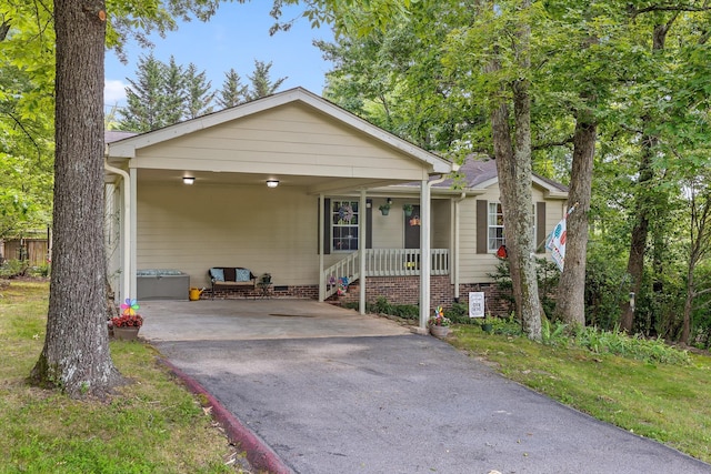 1018 Ridgeway Ave, Signal Mountain, TN 37377 - ranch-style home featuring driveway, a carport, crawl space, and a porch