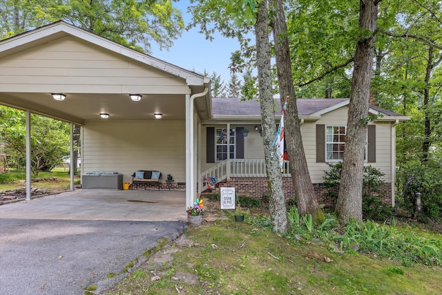 1018 Ridgeway Ave, Signal Mountain, TN 37377 - view of front of home with asphalt driveway and a carport