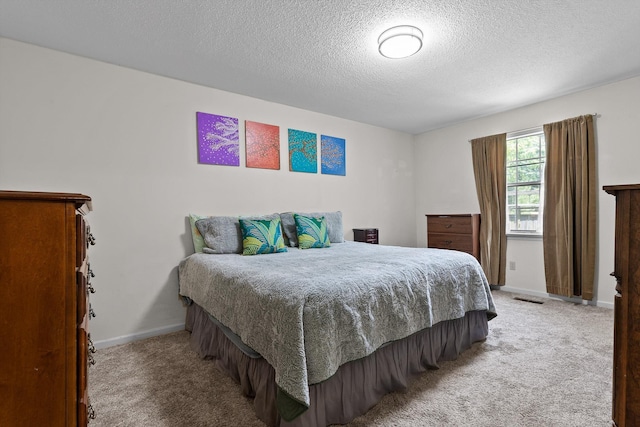 1018 Ridgeway Ave, Signal Mountain, TN 37377 - carpeted bedroom with a textured ceiling and baseboards