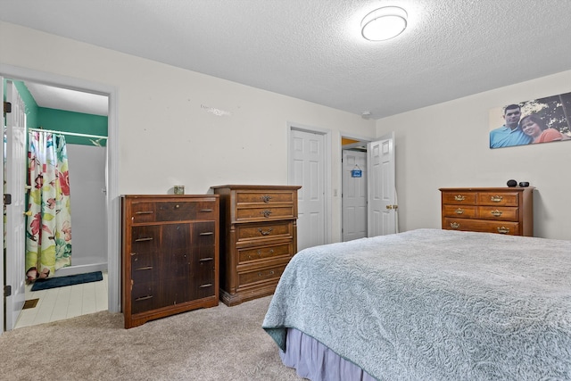 1018 Ridgeway Ave, Signal Mountain, TN 37377 - carpeted bedroom with a textured ceiling