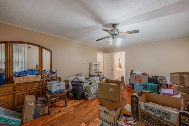 200 Whippoorwill Ln, Lafayette, GA 30728 - bedroom with wood finished floors, crown molding, a textured ceiling, and arched walkways
