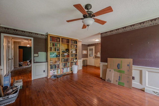 200 Whippoorwill Ln, Lafayette, GA 30728 - interior space with ornamental molding, hardwood / wood-style floors, a wainscoted wall, a decorative wall, and radiator heating unit