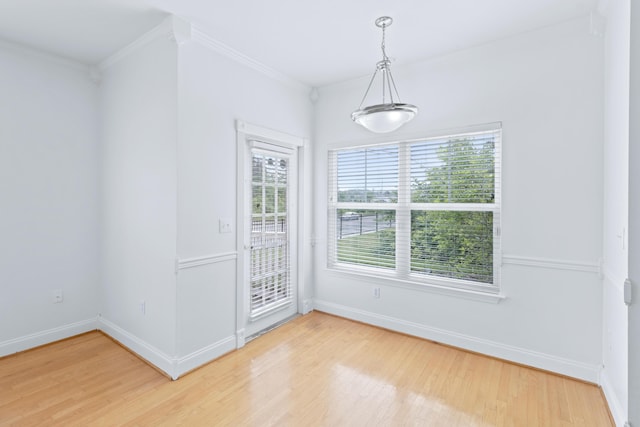 3102 Regency Ct, Chattanooga, TN 37421 - unfurnished dining area with light wood finished floors and ornamental molding