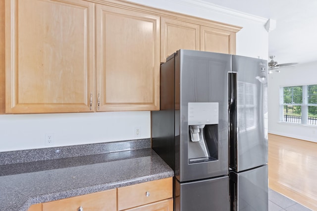 3102 Regency Ct, Chattanooga, TN 37421 - kitchen with stainless steel refrigerator with ice dispenser, light brown cabinets, dark countertops, ceiling fan, and tile patterned flooring