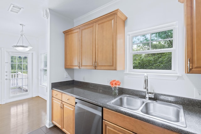 3102 Regency Ct, Chattanooga, TN 37421 - kitchen with stainless steel dishwasher, dark countertops, crown molding, pendant lighting, and dark tile patterned flooring