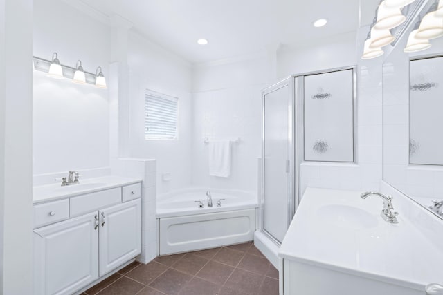 3102 Regency Ct, Chattanooga, TN 37421 - bathroom featuring two vanities, tile patterned floors, a shower stall, a bath, and crown molding