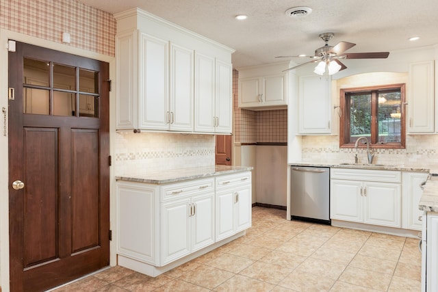 1920 Campbell Dr NW, Cleveland, TN 37312 - kitchen with dishwasher, a ceiling fan, backsplash, light stone counters, and white cabinets