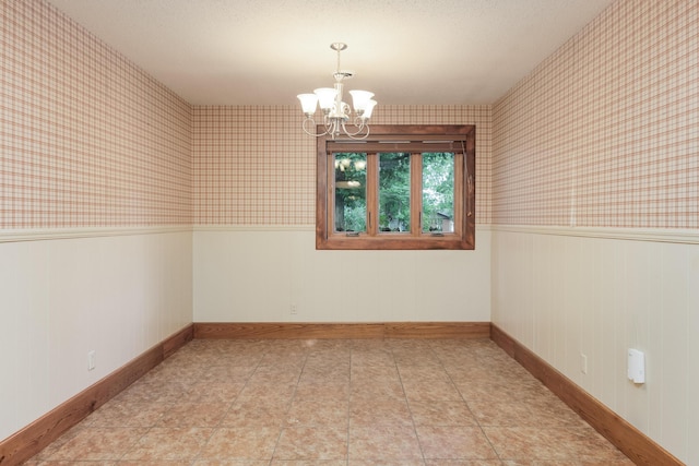 1920 Campbell Dr NW, Cleveland, TN 37312 - unfurnished room with a wainscoted wall, a chandelier, and wallpapered walls