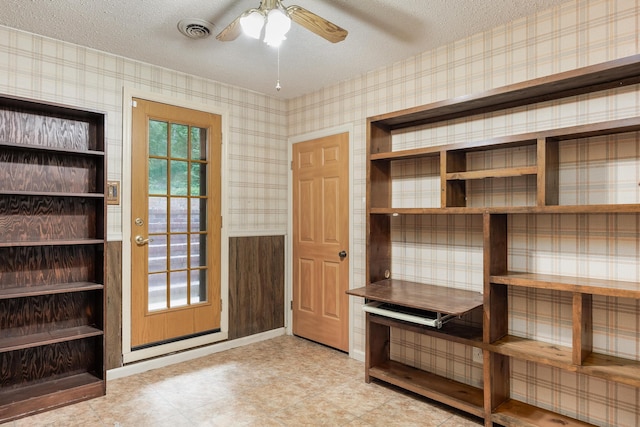 1920 Campbell Dr NW, Cleveland, TN 37312 - unfurnished office featuring wallpapered walls, a textured ceiling, and ceiling fan
