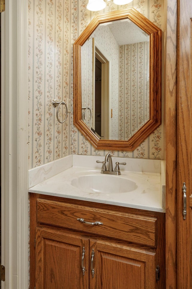 1920 Campbell Dr NW, Cleveland, TN 37312 - bathroom featuring wallpapered walls and vanity