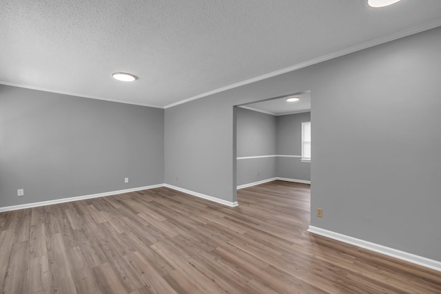 5506 Sunny Dell Ln, Chattanooga, TN 37412 - unfurnished room featuring ornamental molding, wood finished floors, and a textured ceiling