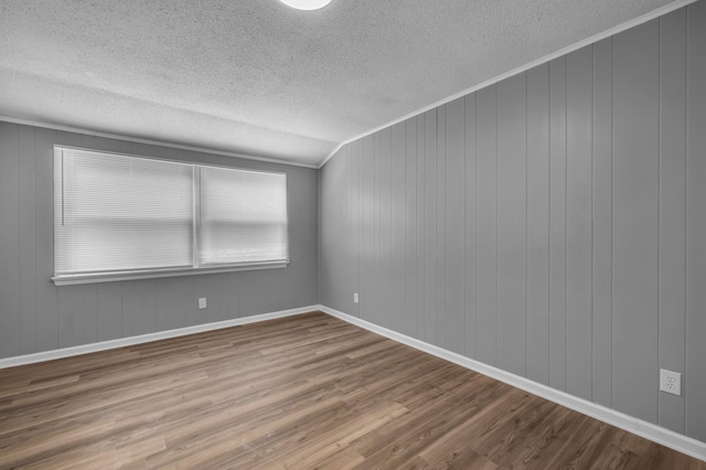 5506 Sunny Dell Ln, Chattanooga, TN 37412 - empty room with a textured ceiling and wood finished floors