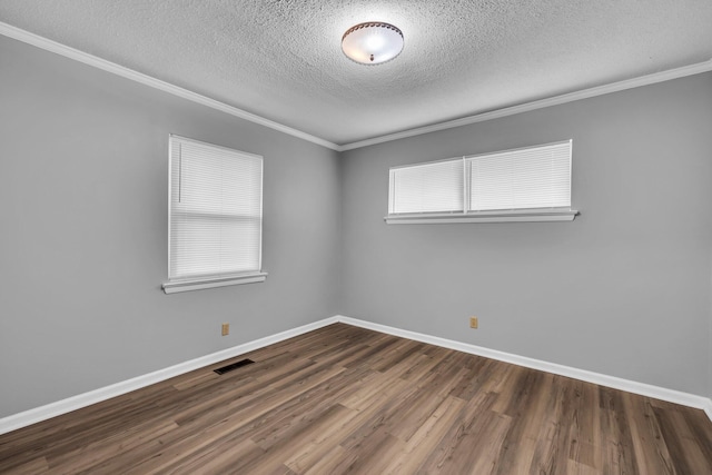 5506 Sunny Dell Ln, Chattanooga, TN 37412 - empty room featuring a textured ceiling, wood finished floors, and crown molding