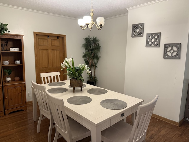 210 Laurel Ave, South Pittsburg, TN 37380 - dining room with a chandelier, dark wood-style flooring, and ornamental molding