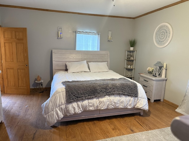 210 Laurel Ave, South Pittsburg, TN 37380 - bedroom with ornamental molding and wood finished floors