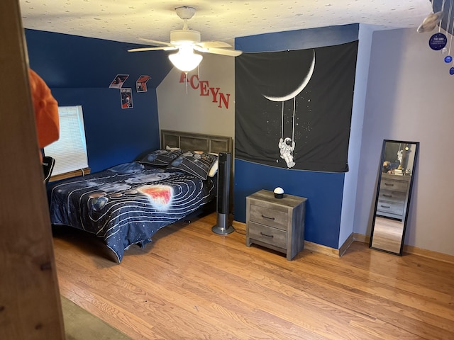 210 Laurel Ave, South Pittsburg, TN 37380 - bedroom with wood finished floors and a ceiling fan