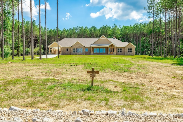 220 High Point Ln, Jasper, TN 37347 - single story home featuring a forest view and a front lawn