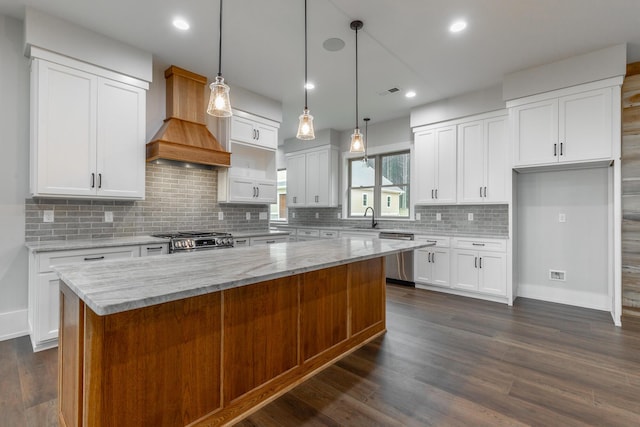 220 High Point Ln, Jasper, TN 37347 - kitchen with custom range hood, stainless steel dishwasher, stove, a center island, and dark wood-style flooring