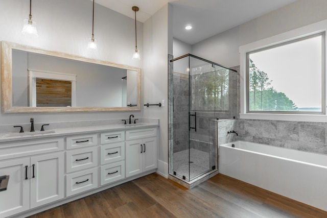 220 High Point Ln, Jasper, TN 37347 - full bathroom featuring a bath, a shower stall, double vanity, and wood finished floors