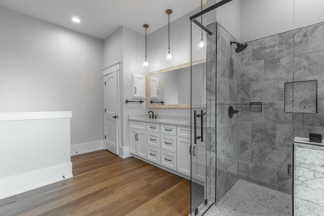 220 High Point Ln, Jasper, TN 37347 - full bathroom featuring a shower stall, double vanity, wood finished floors, and recessed lighting