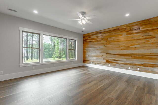 220 High Point Ln, Jasper, TN 37347 - unfurnished room with ceiling fan, wood walls, recessed lighting, and wood finished floors