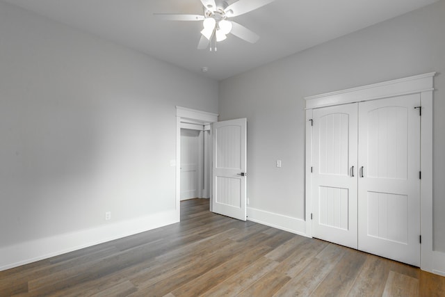220 High Point Ln, Jasper, TN 37347 - unfurnished bedroom featuring wood finished floors, a closet, and ceiling fan