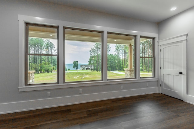 220 High Point Ln, Jasper, TN 37347 - empty room with dark wood-style flooring and recessed lighting