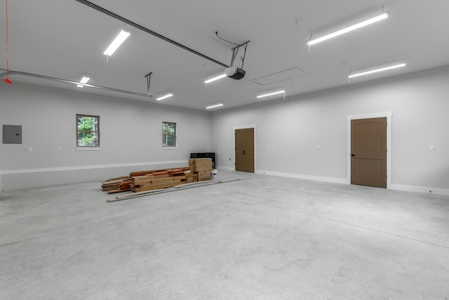 220 High Point Ln, Jasper, TN 37347 - garage with a garage door opener and electric panel