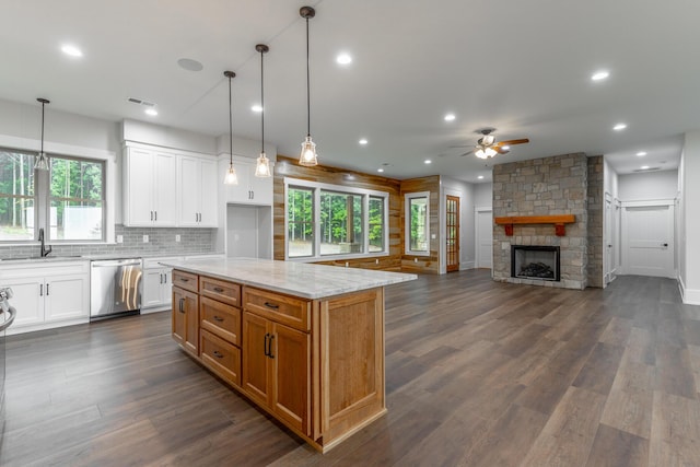 220 High Point Ln, Jasper, TN 37347 - kitchen featuring dishwasher, ceiling fan, light stone counters, dark wood-style flooring, and white cabinets