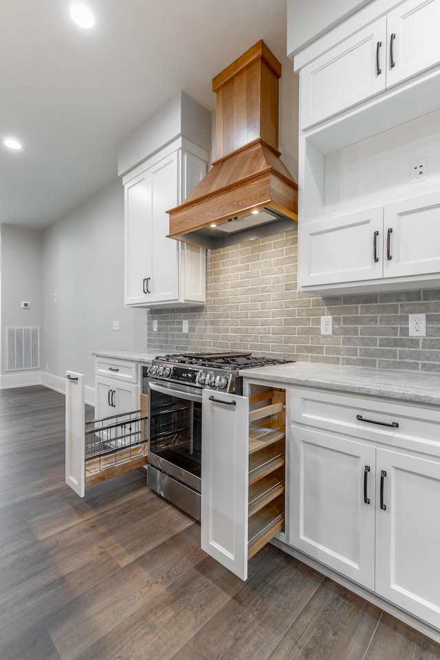 220 High Point Ln, Jasper, TN 37347 - kitchen featuring gas range, custom exhaust hood, dark wood-style floors, white cabinetry, and decorative backsplash