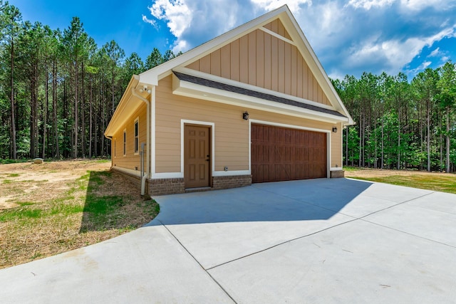 220 High Point Ln, Jasper, TN 37347 - garage featuring a detached garage and a view of trees