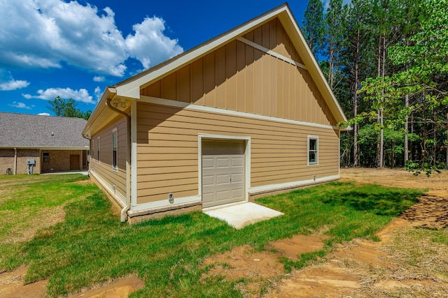 220 High Point Ln, Jasper, TN 37347 - view of home's exterior featuring board and batten siding and a lawn