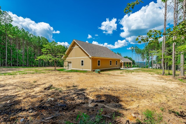 220 High Point Ln, Jasper, TN 37347 - view of side of property with board and batten siding