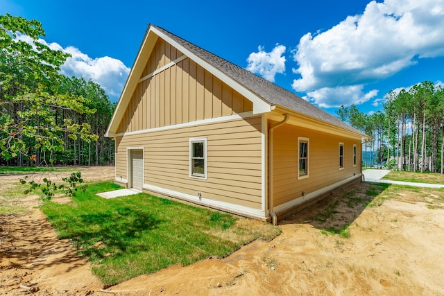 220 High Point Ln, Jasper, TN 37347 - view of home's exterior featuring board and batten siding and roof with shingles