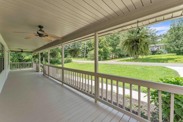 158 Bailey Cir SW, Cleveland, TN 37311 - wooden porch with ceiling fan and a yard