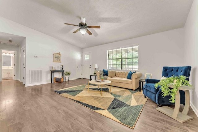 158 Bailey Cir SW, Cleveland, TN 37311 - living area with wood finished floors and a ceiling fan
