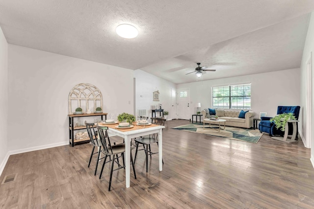 158 Bailey Cir SW, Cleveland, TN 37311 - dining space with a ceiling fan, a textured ceiling, and wood finished floors
