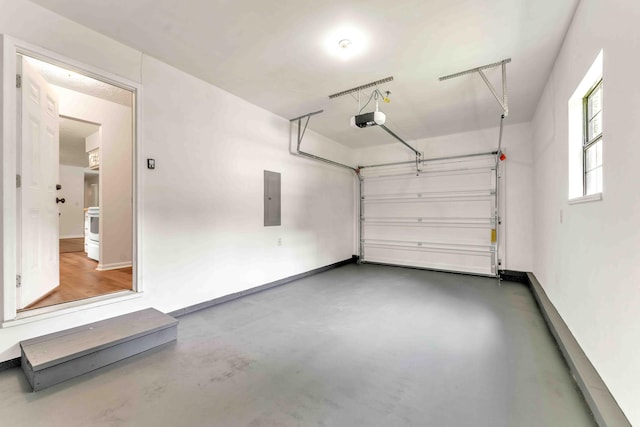 158 Bailey Cir SW, Cleveland, TN 37311 - garage with electric panel and a garage door opener