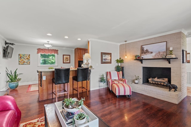 4522 Cloverdale Loop, Hixson, TN 37343 - living area with wood finished floors, crown molding, recessed lighting, and a fireplace
