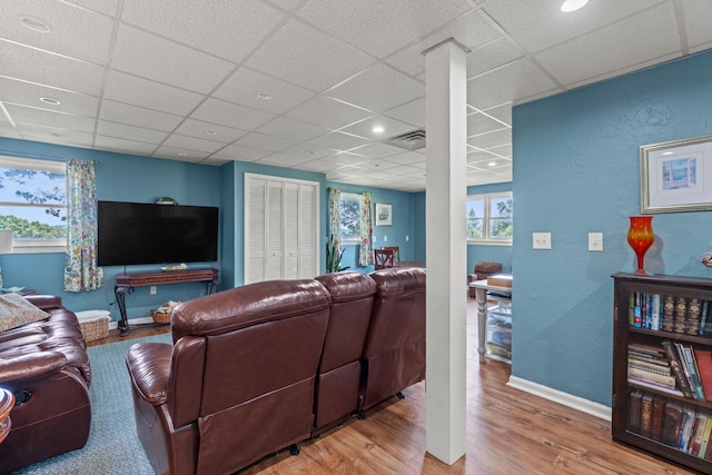 4522 Cloverdale Loop, Hixson, TN 37343 - living room with wood finished floors and a paneled ceiling