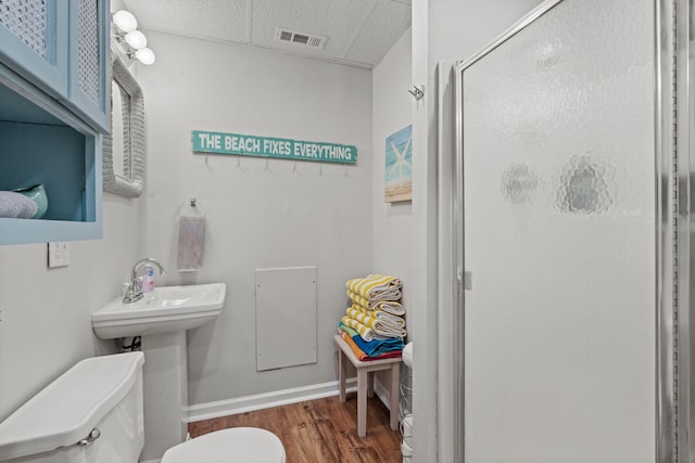 4522 Cloverdale Loop, Hixson, TN 37343 - full bath featuring a paneled ceiling, a stall shower, and wood finished floors