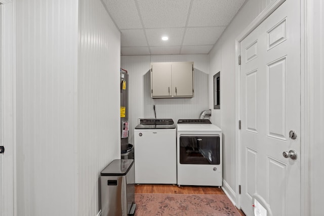 4522 Cloverdale Loop, Hixson, TN 37343 - laundry area featuring washer and clothes dryer, cabinet space, wood finished floors, recessed lighting, and water heater