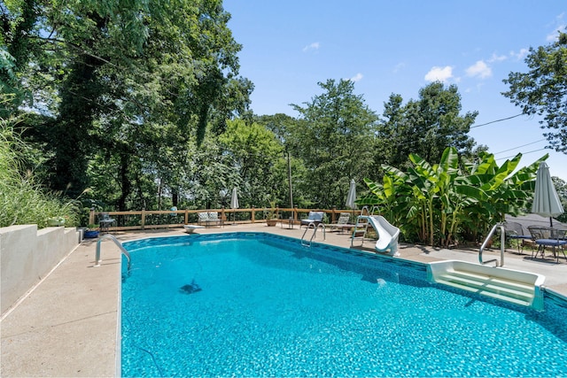 4522 Cloverdale Loop, Hixson, TN 37343 - view of swimming pool featuring a diving board, a water slide, and a patio