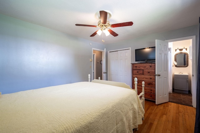 1318 Joiner Rd, Chattanooga, TN 37421 - bedroom featuring wood finished floors, a closet, a ceiling fan, and ensuite bathroom